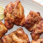 Air Fryer Chicken Thighs Kept on a plate